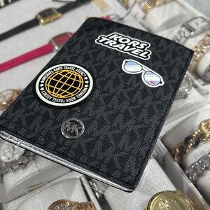 Michael Kors Jet Set Travel Md Embellished Signature Logo Passport Case
Black